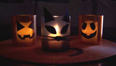 Plastic glasses do double-duty as Halloween votive candles