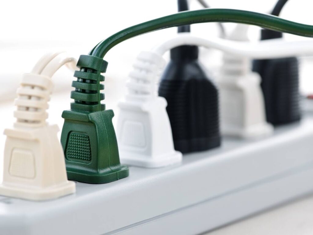 home electrical safety close up of several plugs in a power strip