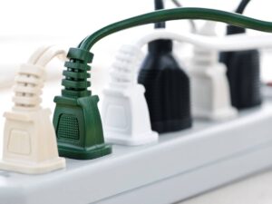 home electrical safety close up of several plugs in a power strip
